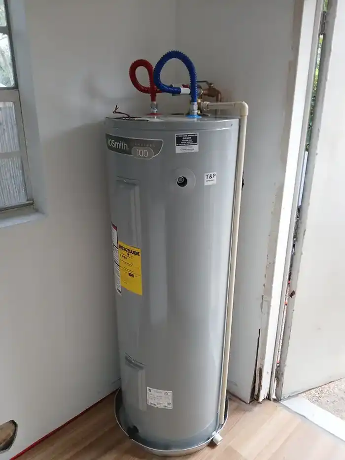 Newly installed residential water heater with clean supply line connections